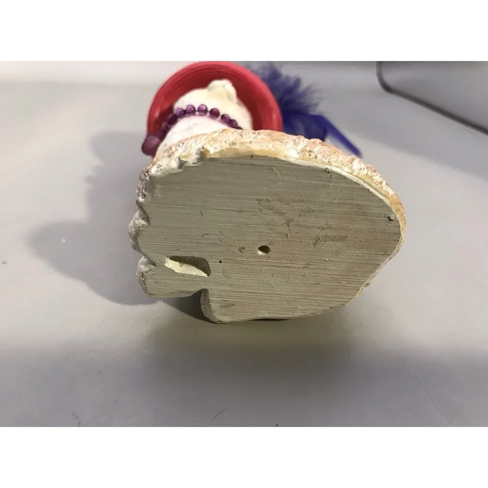 Pretty White Resin Kitty With A Red Hat With Purple Feather